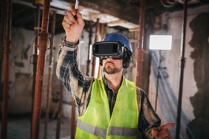 Construction site worker wearing smart goggles