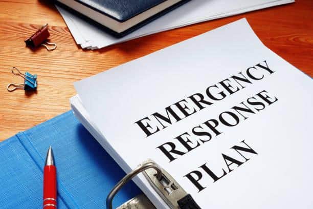Open folder containing an emergency response plan