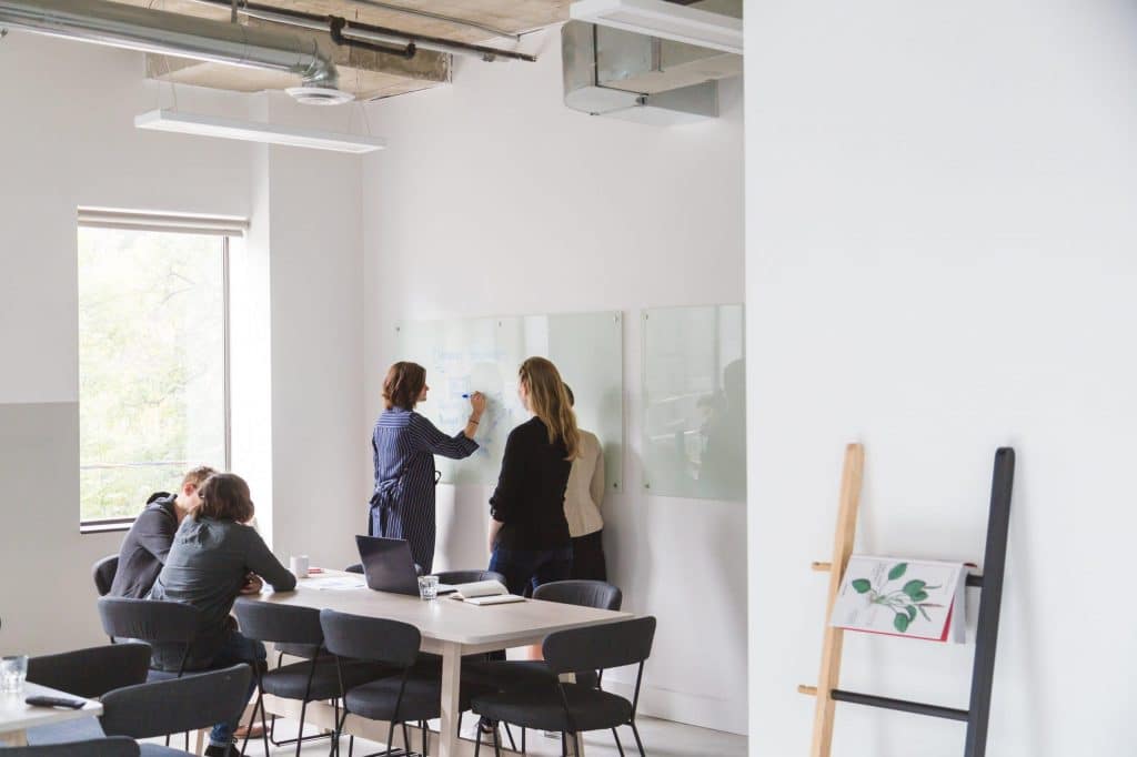 A group of people brainstorming in an office